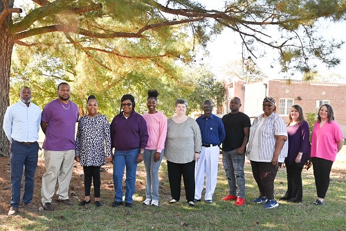 (Left to Right): (Administrators) Chris Phillips, NHA Assist. Hillside Unit; Tim McCormick, Richton Comm. Homes Dir.; Cathy Lindsey, Dir. Of Residential Services; (Winners) Mary Graham, Skylar Robertson, Michaela Griffith, Tony Hinton, Ta’Quan Hicks, Georgia Moffett; (Administrators) Amy Smith, NHA Pecan Grove Unit; Andrea Walters, NHA Paul D. Cotten, Sr. Unit; and (Winners Not Pictured) Kimetha Flowers.